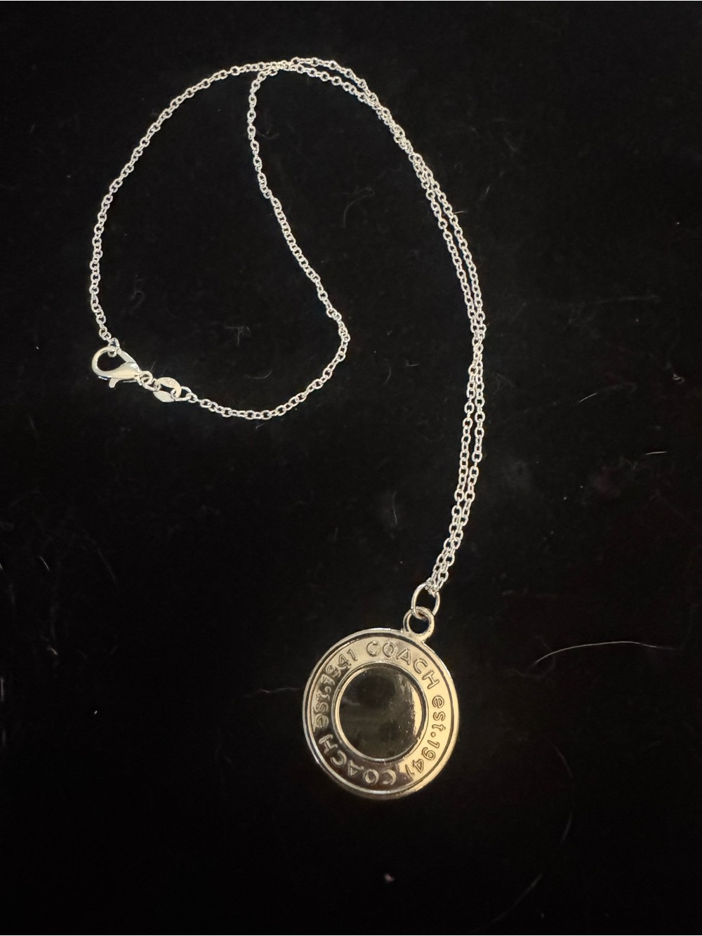 Coach Silver-Tone Round Logo Pendant Necklace